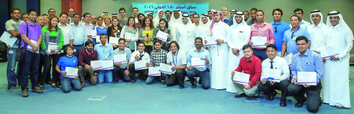 Mohammed Al-Kuwari, Director of Venues and Events at Aspire Logistics, and Abdullah Al-Khater, Events Manager at Aspire Zone Foundation, awarded Certificates of Appreciation to more than 100 volunteers for their dedication during the AIU 50 km World Champ