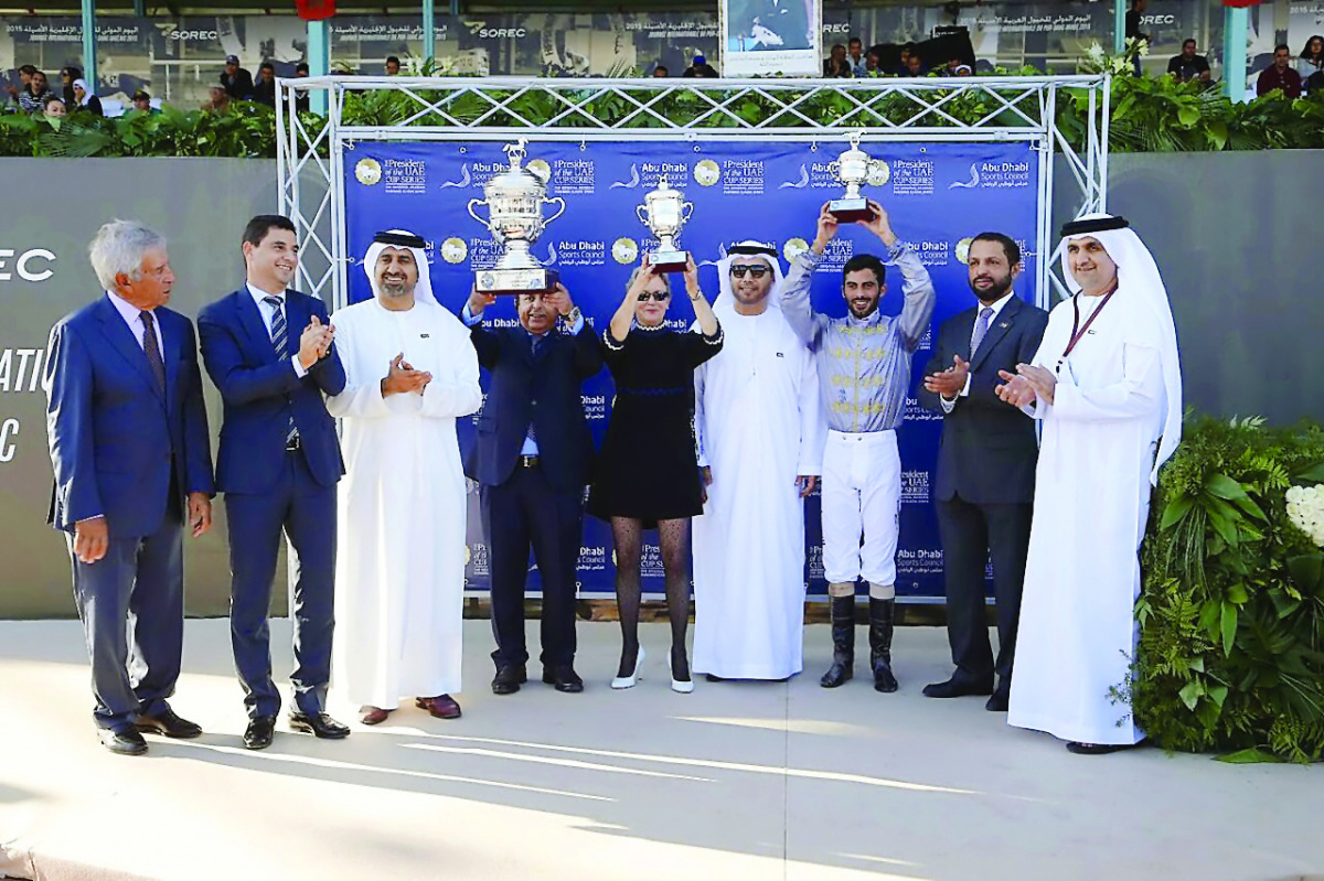 Al Shaqab team officials pose with winner jockey Faleh Bughenaim (3rd right) and the winning trophies in Casablanca, Morocco on Sunday. 