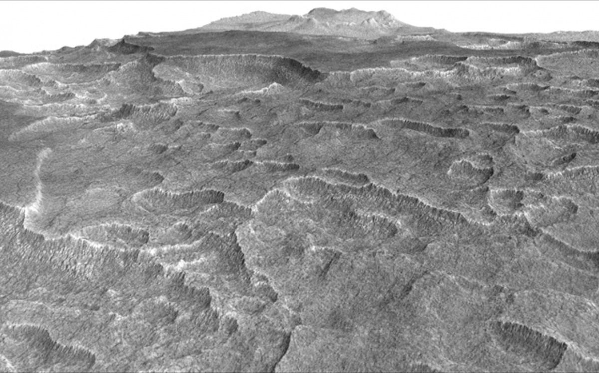 This vertically exaggerated view shows scalloped depressions in a part of Mars where such textures prompted researchers to check for buried ice, using ground-penetrating radar aboard NASA's Mars Reconnaissance Orbiter. NASA/JPL-Caltech/Univ. of Arizona
