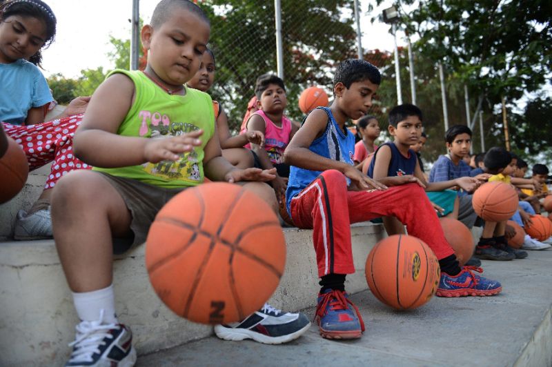 Young Indian children take part in a basketball summer training camp in Hyderabad (AFP Photo/Noah Seelam)