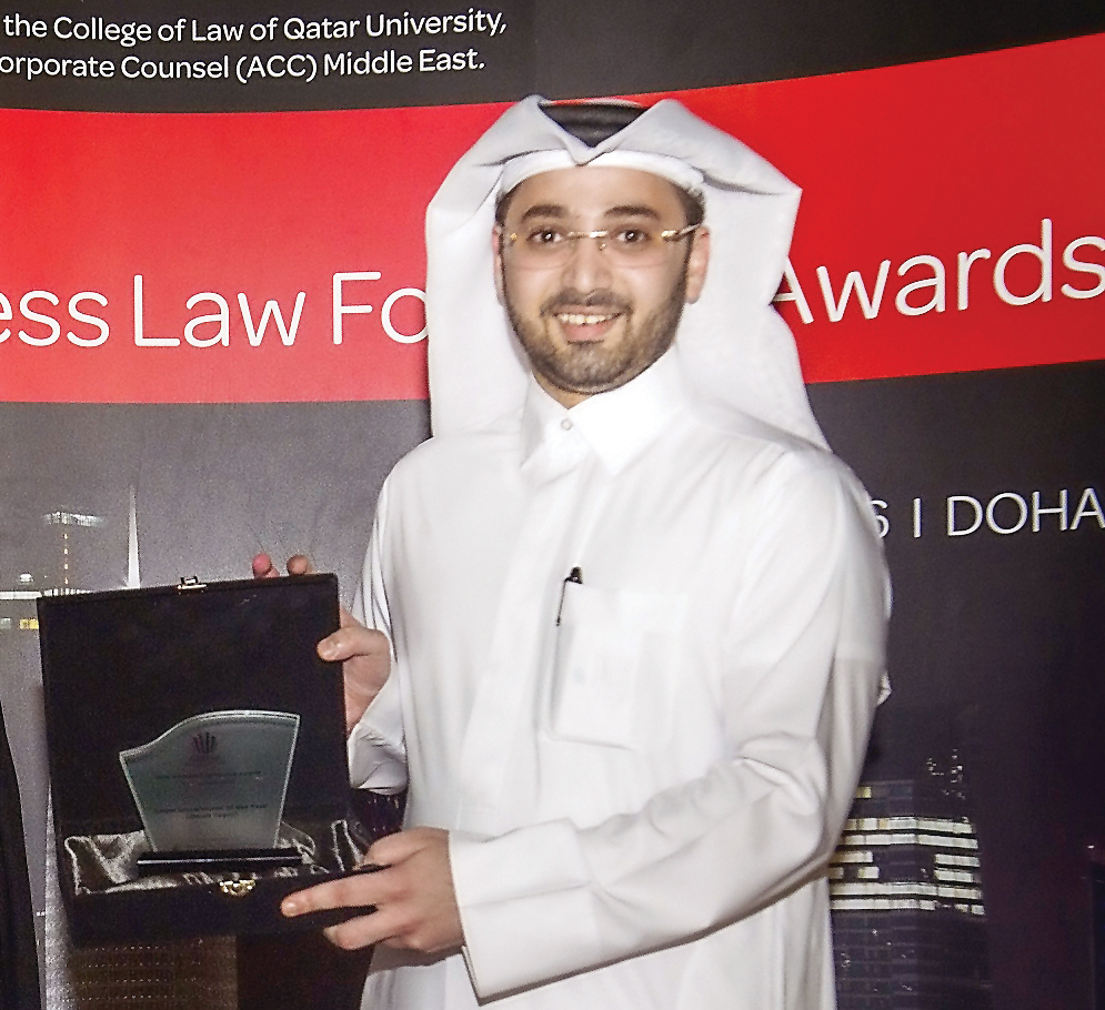 Nasser Al Taweel receiving award.