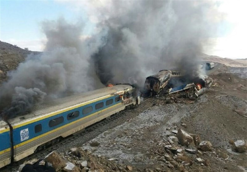 A handout picture released on November 25, 2016 by the Tasnim news agency shows damaged trains following an accident in the Semnan province, some 250 kms east of the Iranian capital Tehran. At least 40 people were killed in Iran early when an intercity ex