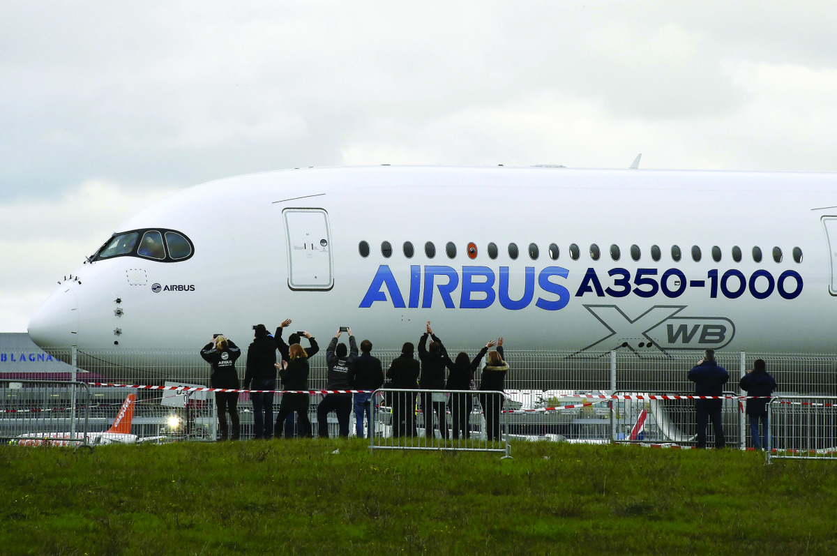 An Airbus A350-1000 new twin-engine passenger carrier during its first test flight in Blagnac, France. Airbus inaugurated its biggest twin-engine, the A350-1000, aimed at competing against Boeing's 