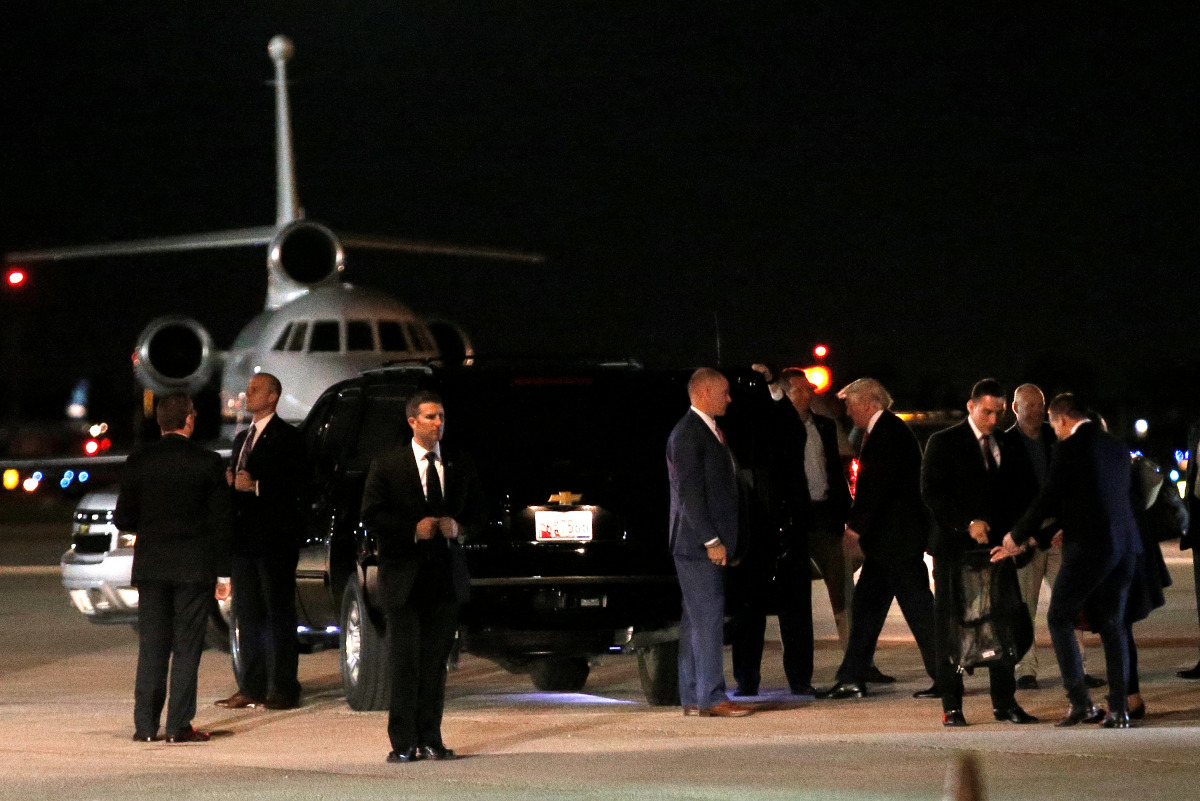 U.S. President-elect Donald Trump walks to his car from his plane after landing in West Palm Beach, Florida, U.S., after traveling from New York to spend the Thanksgiving holiday with family at the Mar-a-Lago estate in Palm Beach, Florida, November 22, 20