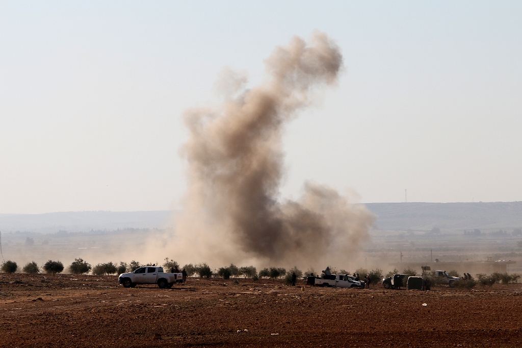Smoke rises after Free Syrian Army attacked Daesh positions near Daesh controlled Bab district during the 