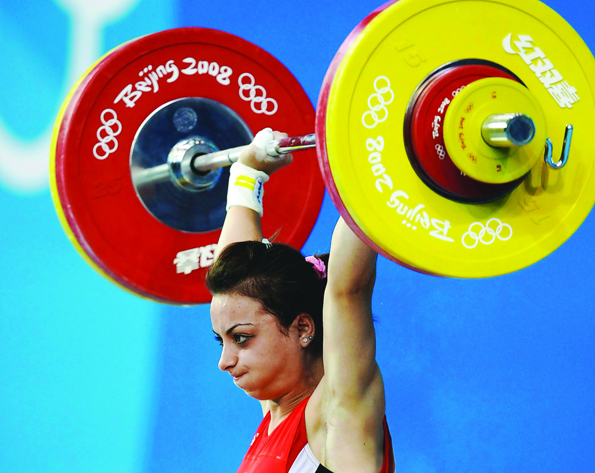Turkey’s Sibel Ozkan in action during the Women’s 48kg Clean and Jerk competition during the 2008 Beijing Olympic Games in Beijing, China in this August 09, 2008 file photo. Ozkan has lost an appeal against a doping sanction which cost her a silver medal 