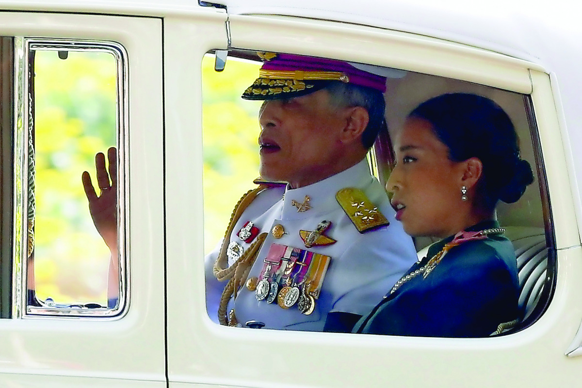 Thailand's new King Maha Vajiralongkorn Bodindradebayavarangkun is seen on his way out from the Grand Palace in Bangkok, yesterday.