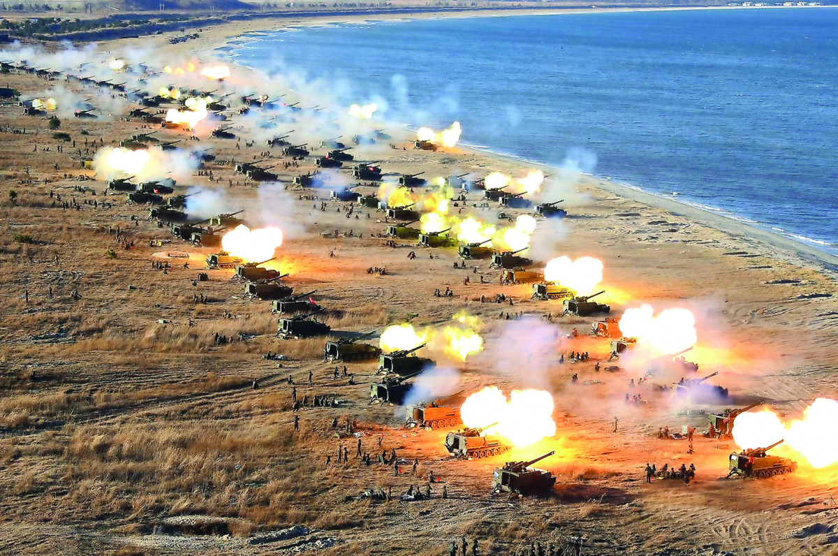 An intensive drill of KPA artillery units on the front which North Korean leader Kim Jong-Un attended, yesterday.