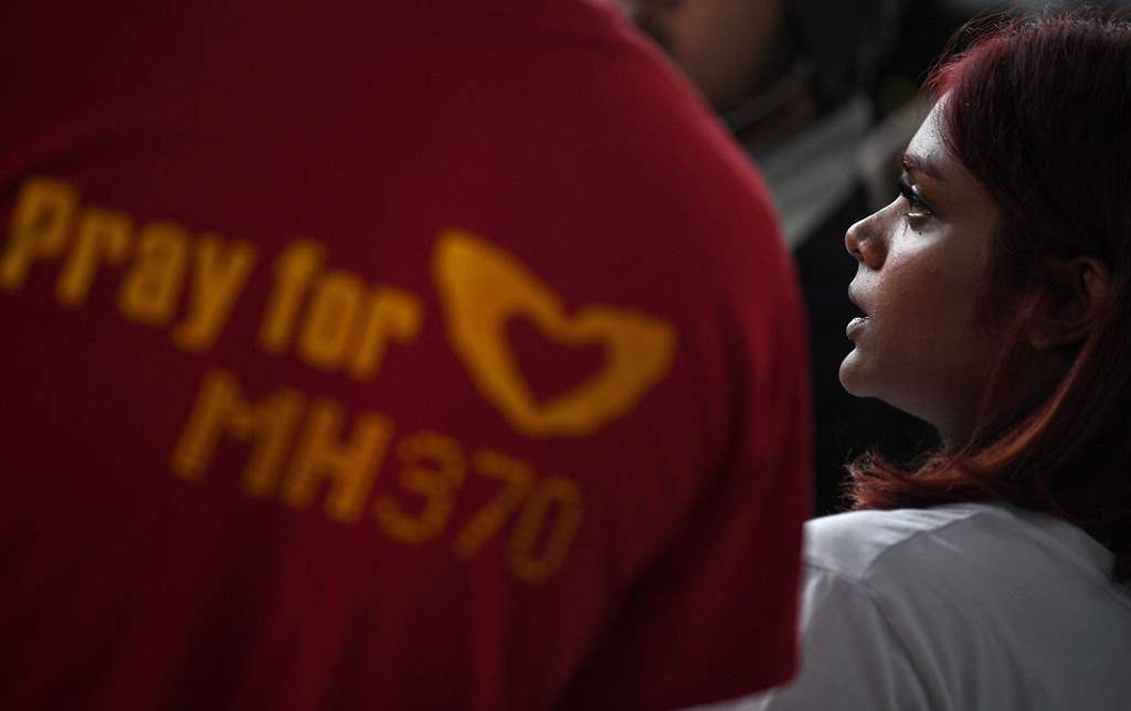 Grace Nathan, whose mother Anne Daisy was onboard the missing Malaysia Airlines flight MH370, addresses the media prior to departing for Madagascar from Kuala Lumpur International Airport in Sepang on December 3, 2016. AFP / Manan VATSYAYANA