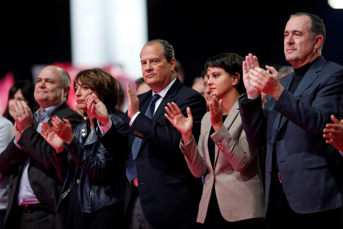French Socialist Party First Secretary Jean-Christophe Cambadelis (C) gives Francois Hollande standing ovation during the convention of the Belle Alliance Populaire (Nice Popular Union), a gathering aiming at uniting democrats, socialists, ecologists, int