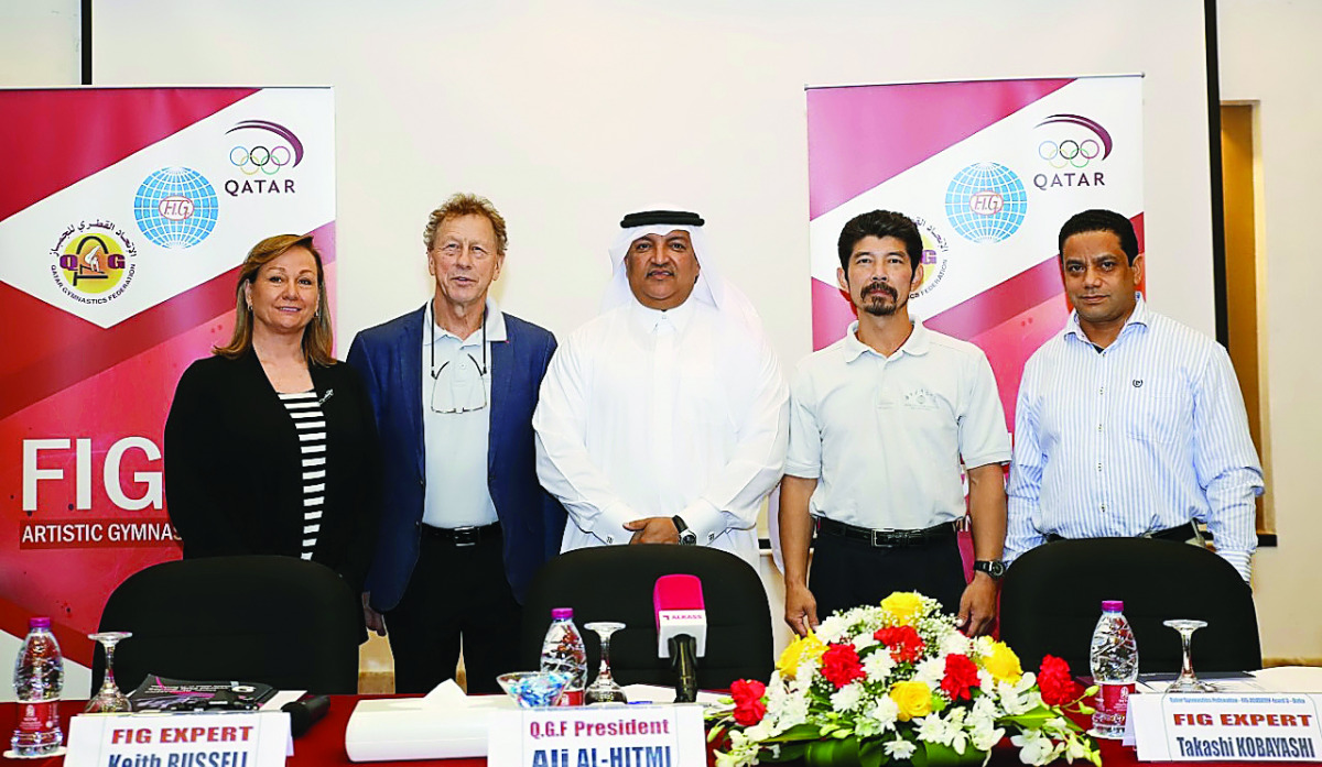 Ali Al Hitmi (centre), the President of the Qatar Gymnastics Federation (QGF), poses for a picture with Keith Russell, Takashi Kobayashi, Monem Jemni and Peggy Liddick, all FIG Experts, during an FIG coaching workshop hosted in Doha. Anis Mustafa is at ri