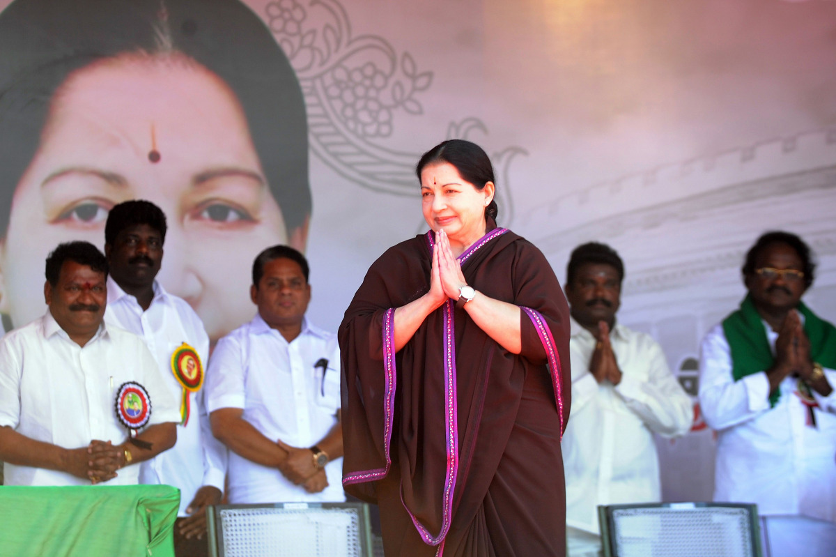 This file photo taken on March 27, 2014 shows All India Anna Dravida Munnetra Kazhagam (AIADMK) Leader and Chief Minister of the southern Indian state of Tamil Nadu J. Jayalalithaa gesturing as she arrives at a public meeting in Pondicherry. Jayalalithaa 