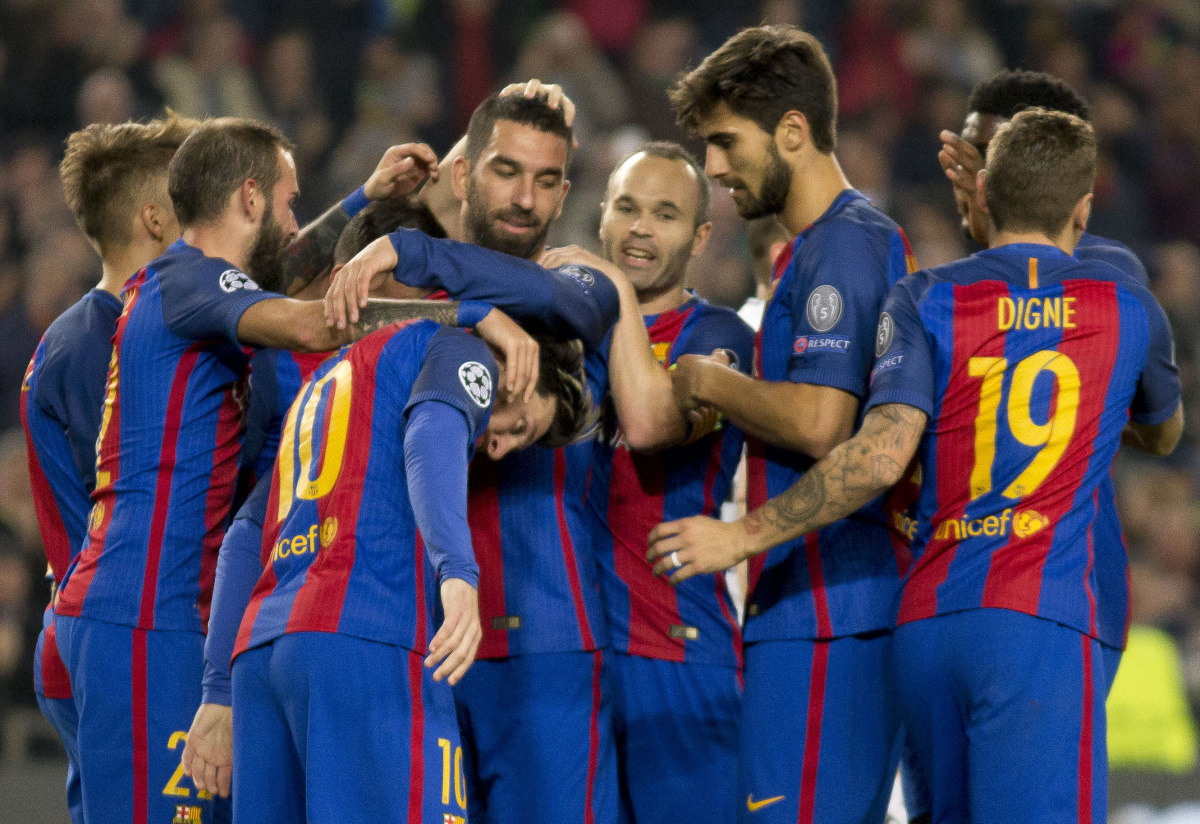 Barcelona's Arda Turan (C) celebrates his second goal with his team mates during the UEFA Champions League match between the FC Barcelona and Borussia Monchengladbach at Camp Nou stadium in Barcelona, Spain on December 6, 2016. (Albert Llop - Anadolu Agen