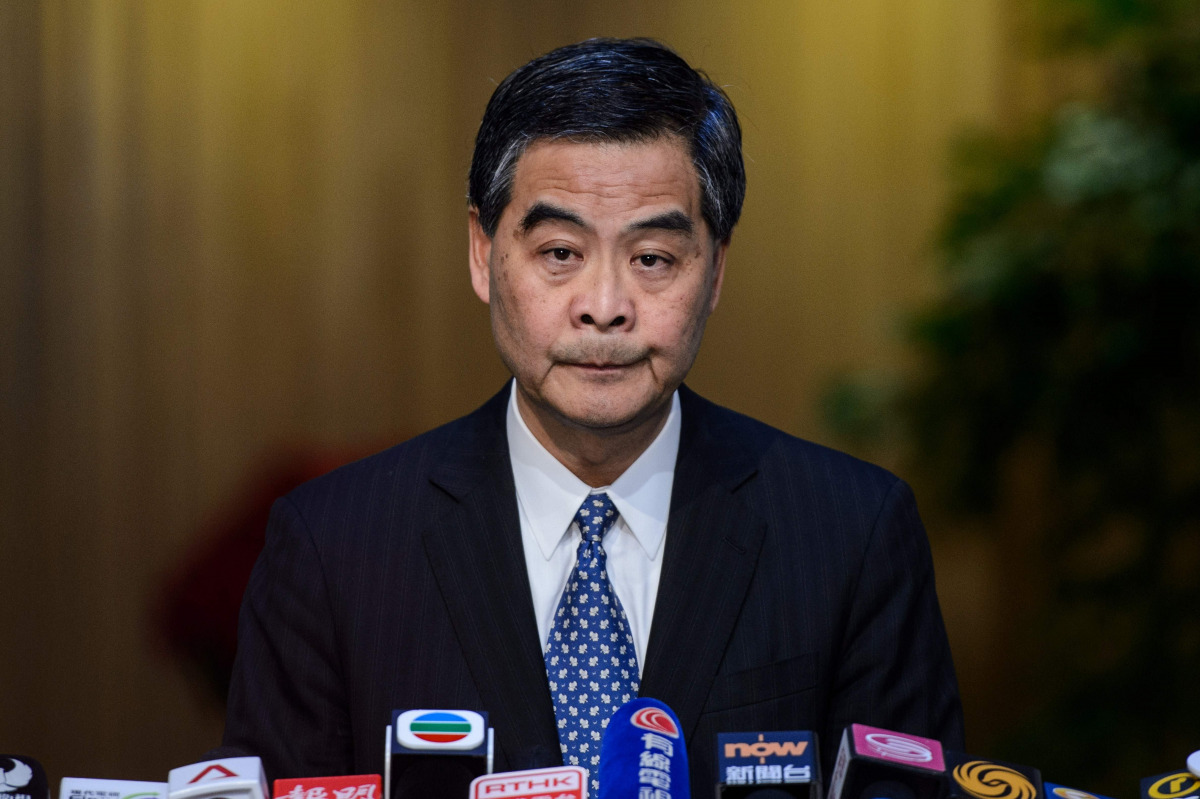 Hong Kong Chief Executive Leung Chun-ying reacts during a press conference in Hong Kong on December 9, 2016. Hong Kong's unpopular leader Leung said that he would not run again for office and would step down at the end of his term in July, citing family r