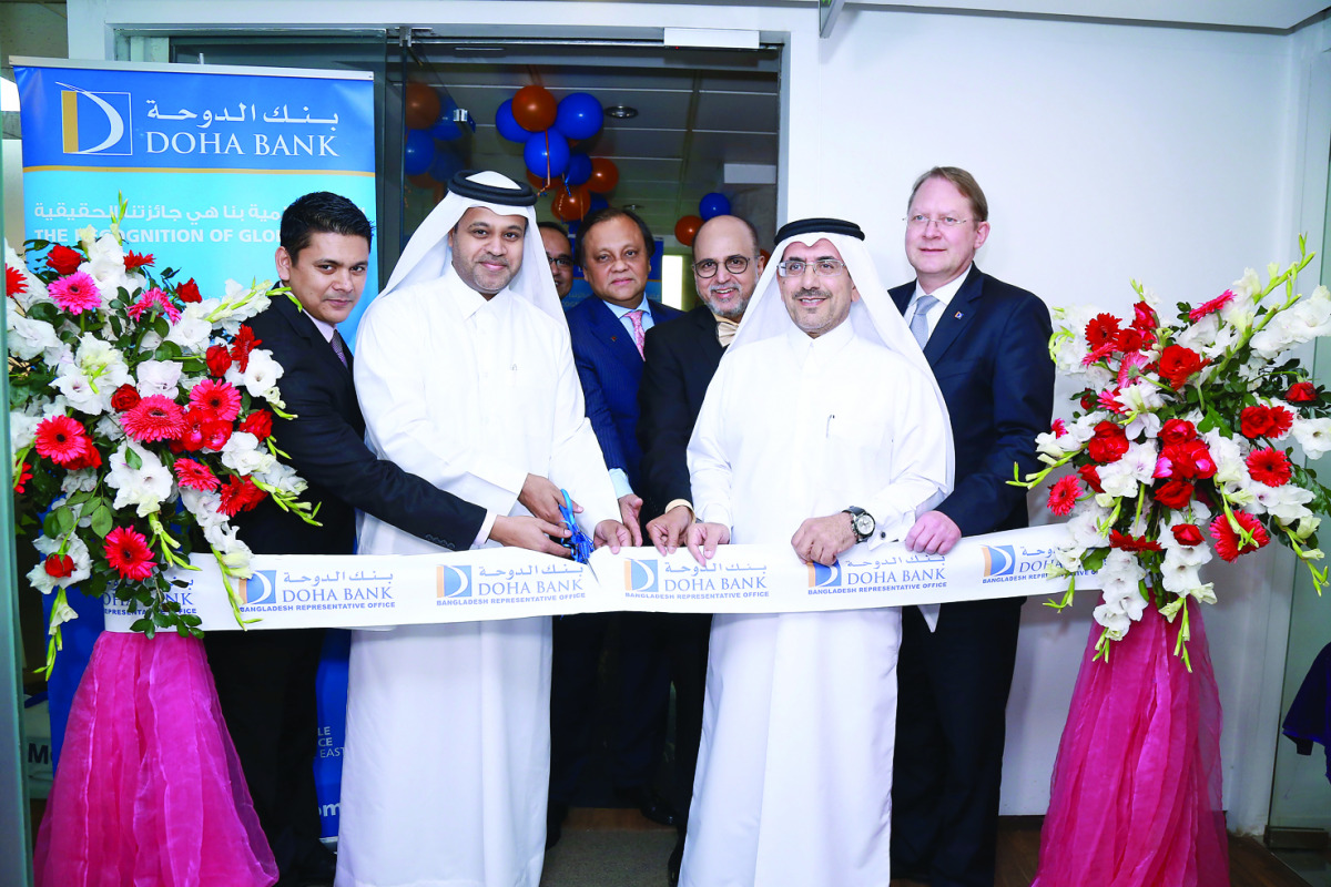 Qatar's Ambassador to Bangladesh, Ahmed Mohamed Al Dehaimi (second left) cutting the ribbon to mark the official inauguration of the Doha Bank's representative office in Dhaka.