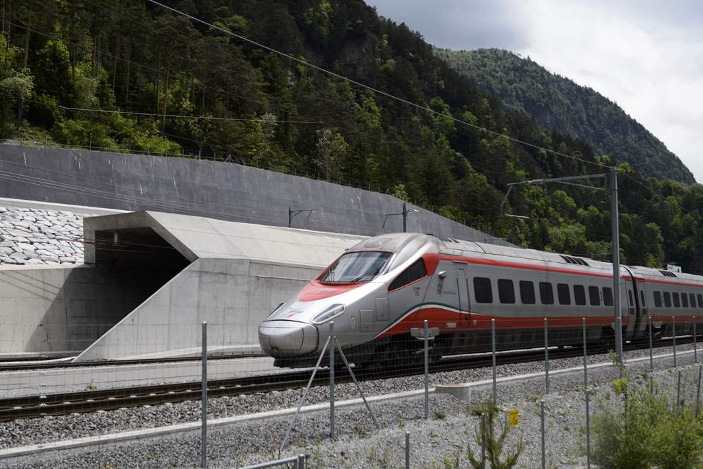 This file photo taken on May 31, 2016 shows an Italian train making its way at the north entrance of the new Gotthard Base Tunnel, the world's longest train tunnel, on the eve of its inauguration in Erstfeld.
Regular rail service through the world's long