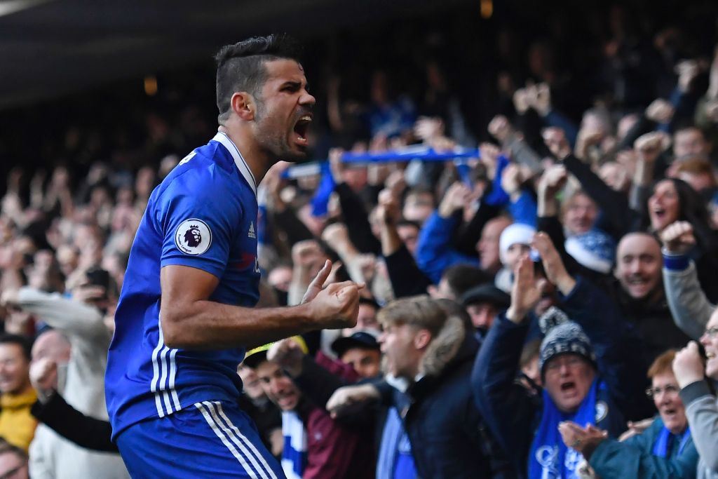 Chelsea's Brazilian-born Spanish striker Diego Costa celebrates after scoring the opening goal of the English Premier League football match between Chelsea and West Bromwich Albion at Stamford Bridge in London on December 11, 2016.  AFP / Justin TALLIS