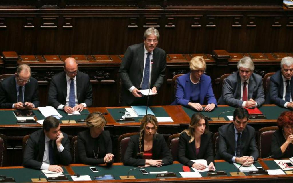 Newly appointed Italian Prime Minister Paolo Gentiloni talks before a confidence vote at the parliament in Rome, Italy, December 13, 2016. REUTERS/Alessandro Bianchi.