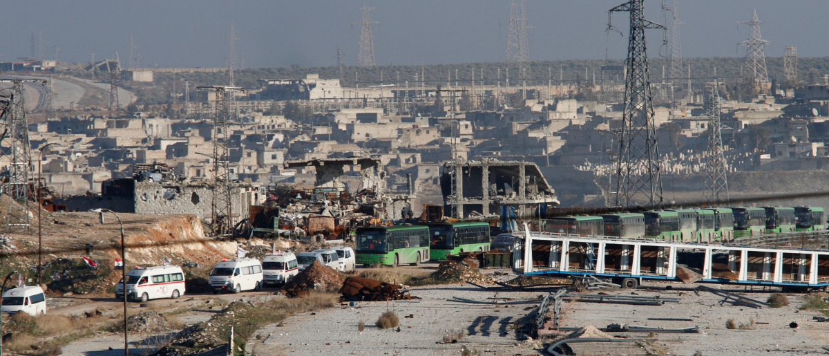 Ambulances and buses evacuating people drive out of a rebel-held part of Aleppo, Syria December 15, 2016. REUTERS/Omar Sanadiki
