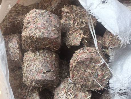Briquettes of shredded notes (Photo courtesy: Gulf News) 