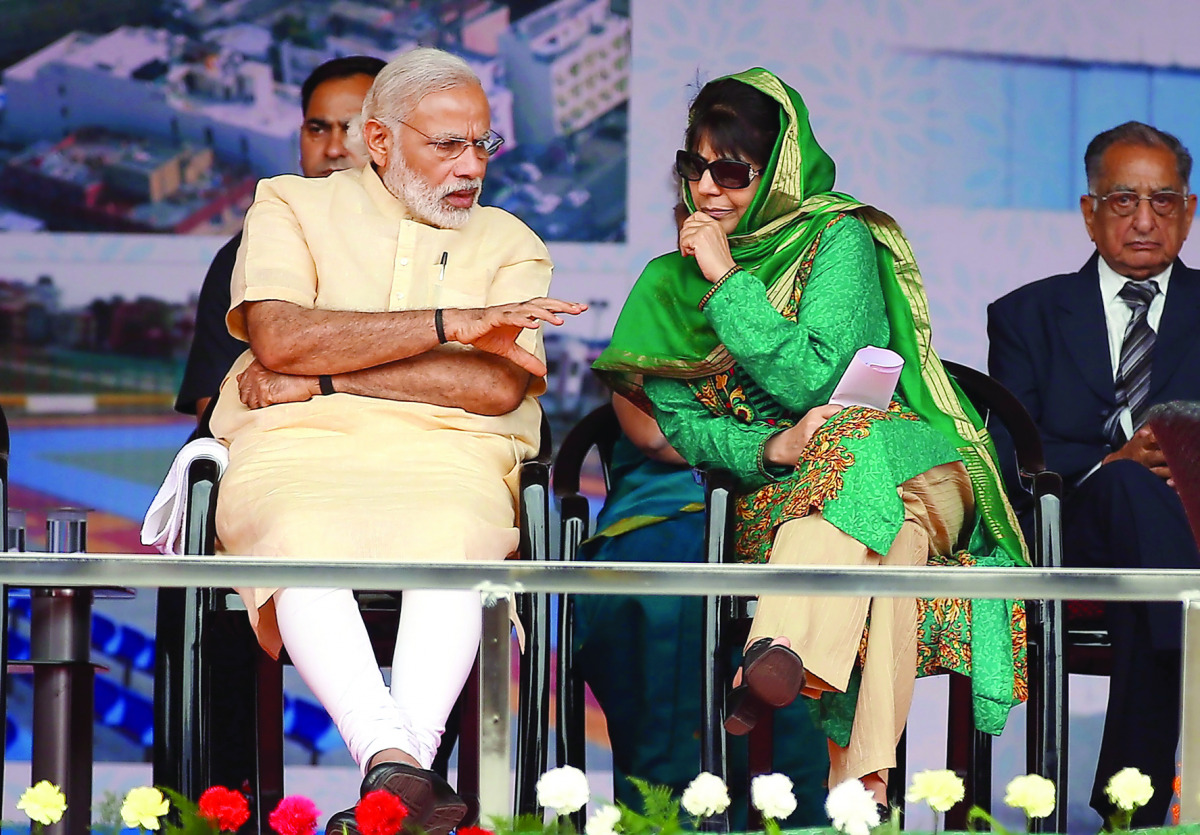 A file picture of Prime Minister Narendra Modi (left) with Jammu and Kashmir Chief Minister Mehbooba Mufti during a public rally in Katra near Jammu.