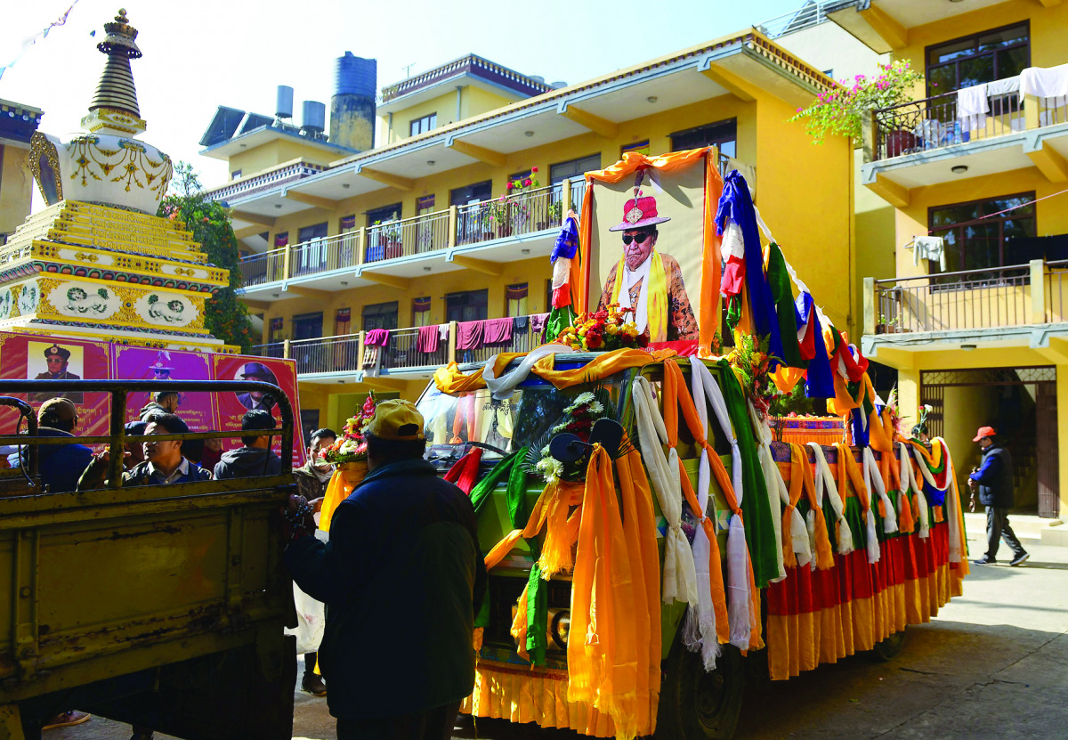 The remains of Jigme Dorje Palbar Bista, the last king of former Himalayan kingdom of Mustang, arrrive for a ceremony at monastery at Bauddha in Kathmandu on December 19, 2016. The last king of the isolated Himalayan region of Upper Mustang died on Decemb