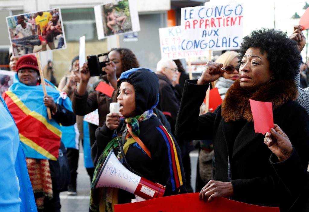 Demonstrators chant slogans against plans of Democratic Republic of Congo's President Joseph Kabila to stay in office past the end of his term, during a protest in central Brussels, Belgium, December 19, 2016. REUTERS/Francois Lenoir