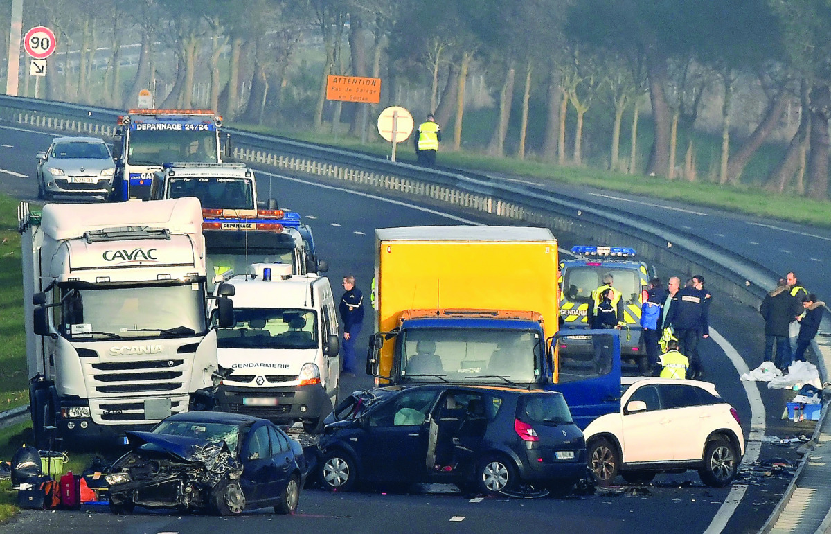 A view of the car accident, involving around fifty vehicles, which killed 5 people and injured 20, on the departmental road D12 between La Roche-sur-Yon and Les Sables d'Olonne, in western France, yesterday.