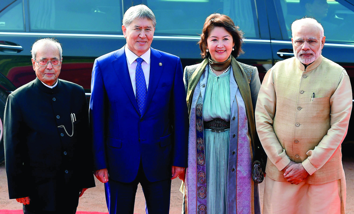 From left: President Pranab Mukherjee, Kyrgyzstan President Almazbek Atambayev, his wife Raisa Atambayeva and Prime Minister Narendra Modi attending a ceremonial reception at the President's House in New Delhi, yesterday.