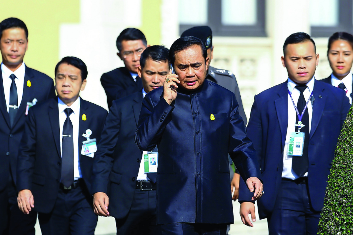 Thailand's Prime Minister Prayuth Chan-ocha arrives at a weekly cabinet meeting at Government House in Bangkok, yesterday.