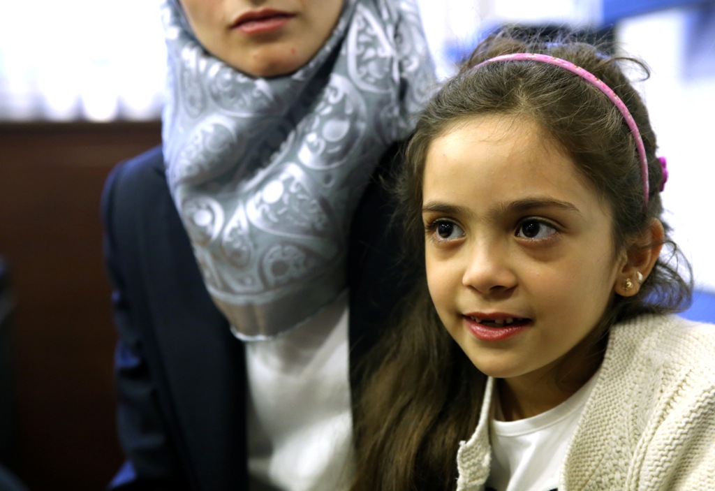Syrian Bana Alabed (R), a seven-year-old girl who tweeted about the attacks in Aleppo, speaks to media with her family after she met with Turkish President Recep Tayyip Erdogan in Ankara, Turkey on December 21, 2016. ( Emre ?eno?lu - Anadolu Agency )
