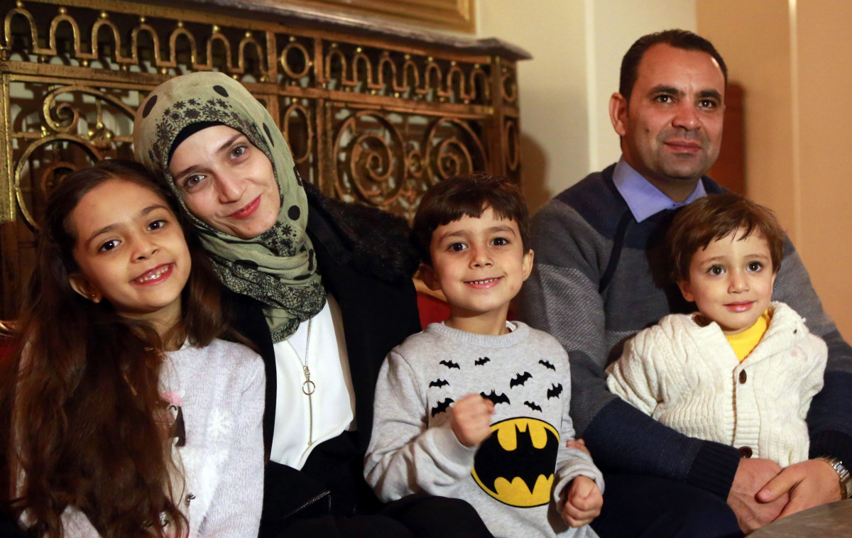 Syrian girl Bana al-Abed (L), known as Aleppo's tweeting girl, poses with her family, her mother Fatemah, her father Ghassan and her brothers Nour (C) and Laith (R) during an interview in Ankara, Turkey, on December 22, 2016. The young Syrian girl was one