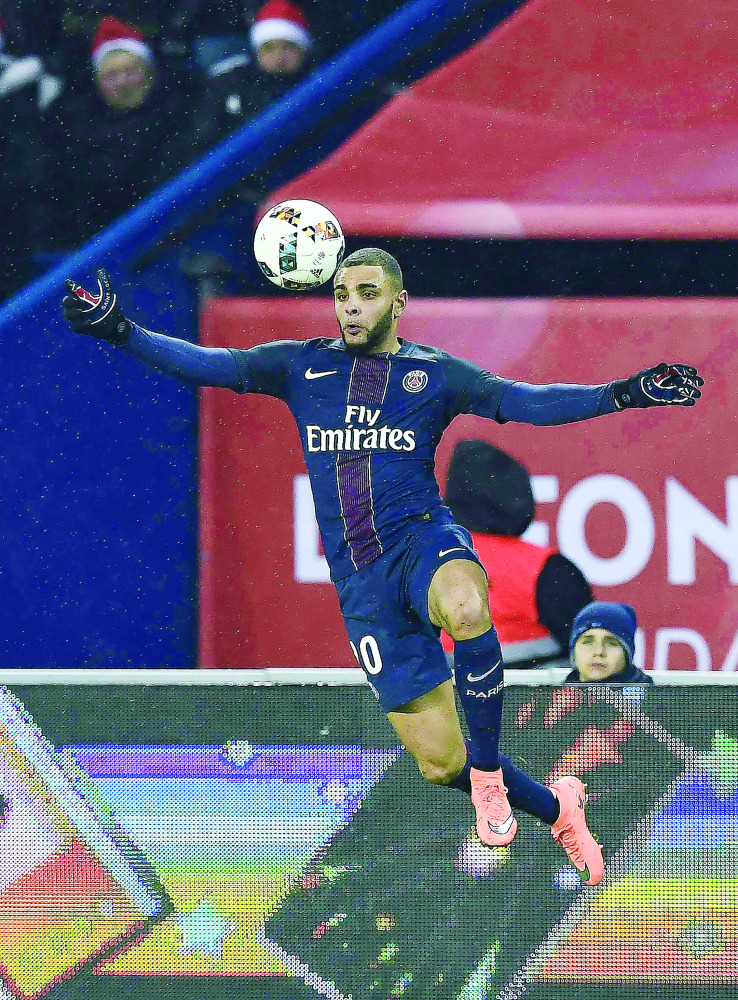 Paris Saint-Germain's Layvin Kurzawa controls the ball during their Ligue 1 match against Lorient at the Parc des Princes stadium in Paris, France on Wednesday.