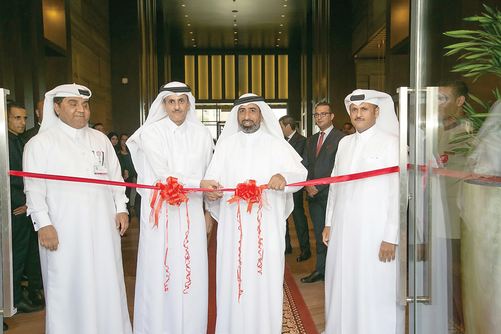 Sheikh Dr Khalid bin Thani bin Abdullah Al Thani (second left), Chairman of Ezdan Holding Group, Ibrahim Al Mohannadi (second right), Strategic Partner of the Group in the hotel, at the opening ceremony.