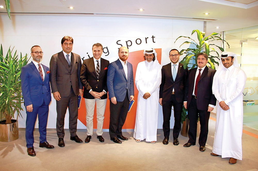 Members of the visiting Turkish delegation, Bilal Erdogan, President of World Ethnosport Confederation,  Ahmet Demirok, Turkish Ambassador to Qatar, Ramil Hasanov, Secretary-General of the Turkic Council and Fikret Orman, President of Besiktas pose for a 