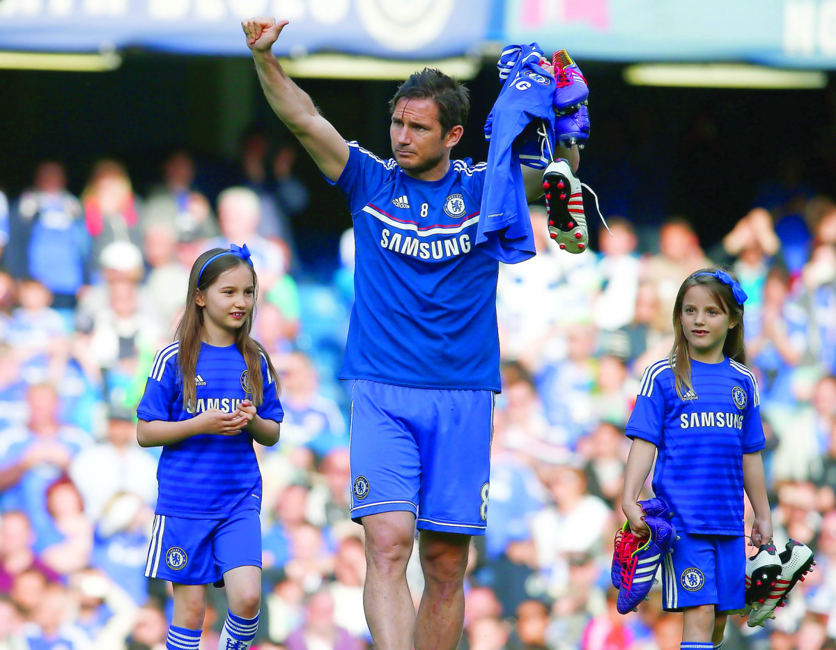 Chelsea’s Frank Lampard walks on the pitch following their English Premier League match against Norwich City at the Stamford Bridge in London, England  in this May 06, 2014 file photo.
