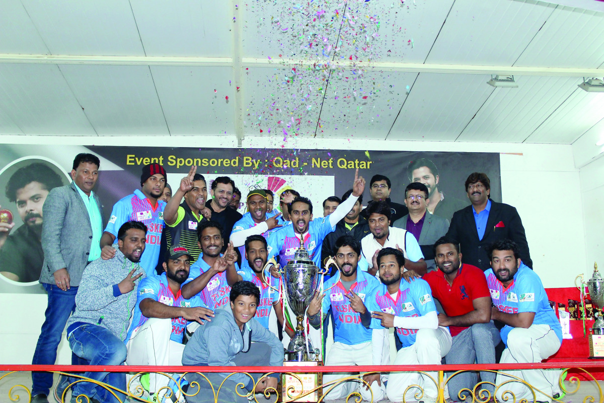 Champion Tuskers pose for a photograph with the trophy and tournament officials. 