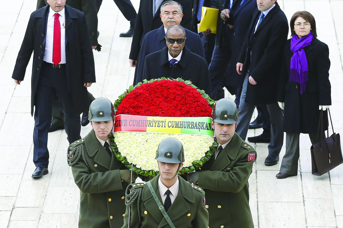 Guinean President Alpha Conde visits Mustafa Kemal Ataturk's mausoleum with Turkish Minister of Education, Ismet Yilmaz, in Ankara, yesterday.