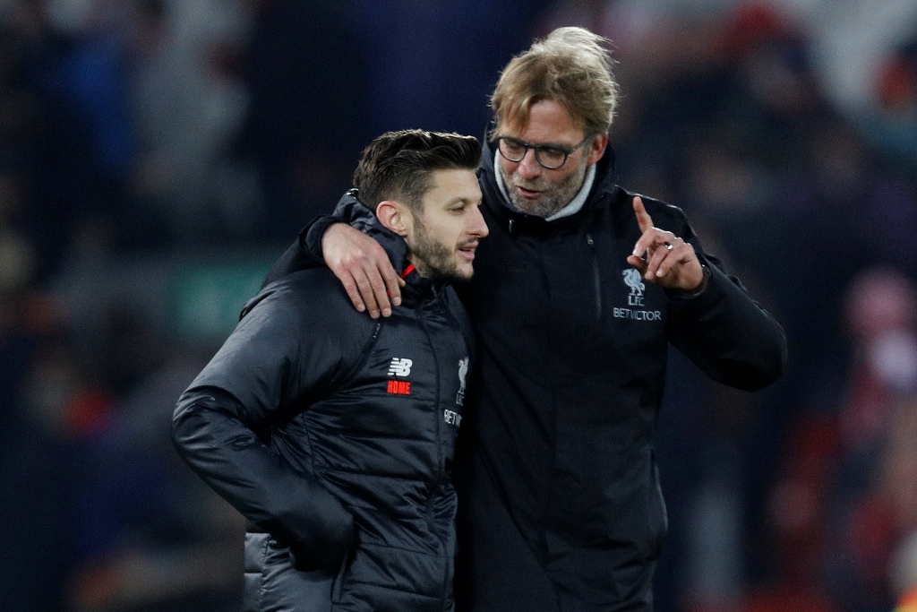 Liverpool manager Juergen Klopp celebrates with Adam Lallana at the end of the match Reuters / Darren Staples 