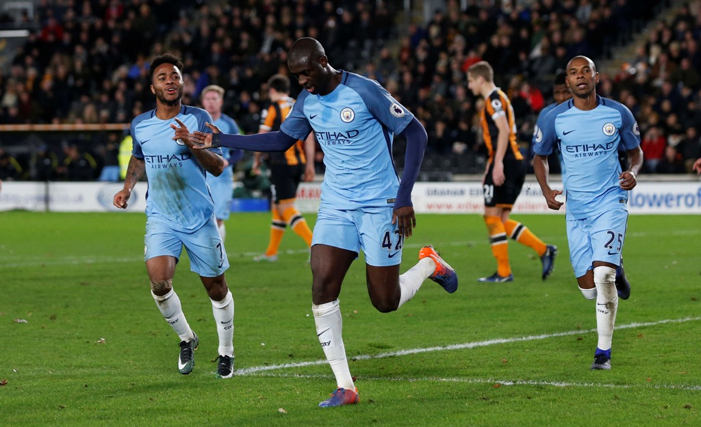 Manchester City's Yaya Toure celebrates scoring their first goal. Reuters / Ed Sykes
