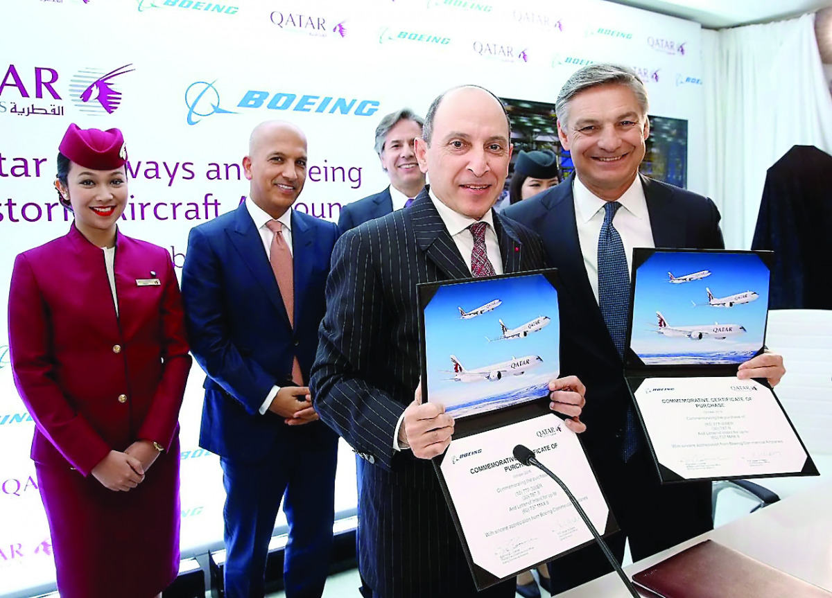 Qatar Airways Group Chief Executive, Akbar Al Baker (second right), and Boeing Commercial Airplanes President and CEO Ray Conner (right) announcing Qatar Airways’ landmark order in October this year, in a file photo. 