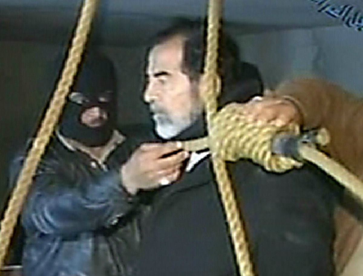 This file video grab taken from al-Iraqiya television on December 30, 2006 shows ousted Iraq president Saddam Hussein moments before being hanged in Baghdad. On December 30, 2006, Saddam was hanged at the military intelligence headquarters in the Kadhimiy