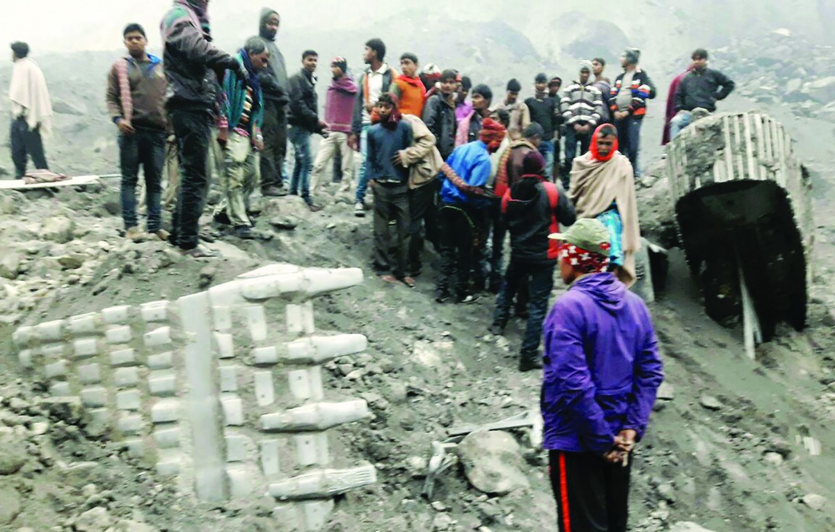 People gathering at the site of a coal mine collapse near Lalmatia in Godda district, in Jharkhand.
