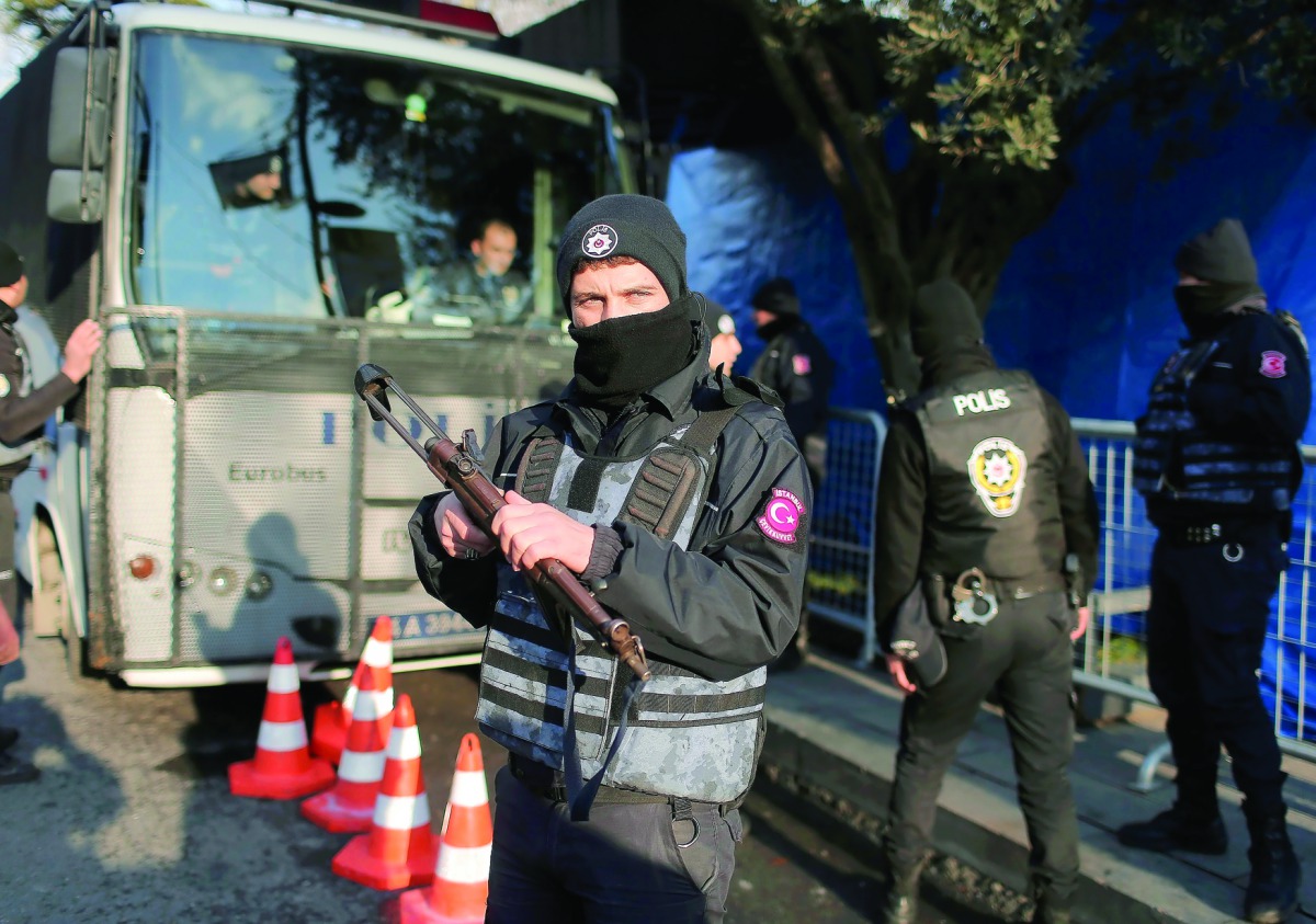 Turkish police stand guard outside the Reina nightclub by the Bosphorus, which was attacked by a gunman, in Istanbul, yesterday.