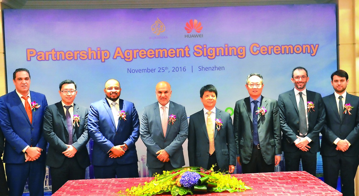 Officials of Al Jazeera Media Network and Huawei at the MoU signing ceremony.