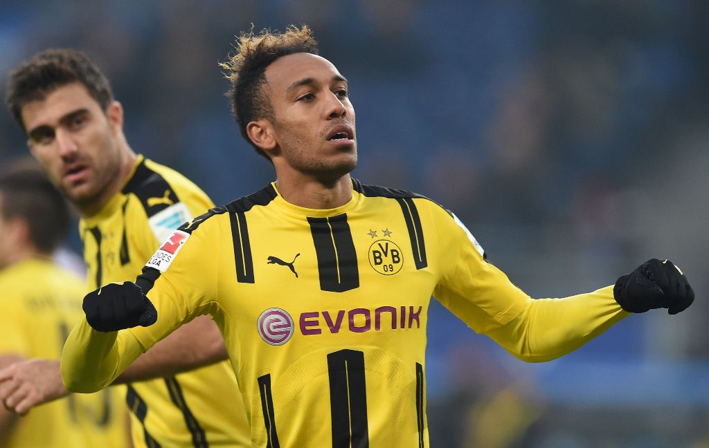 (FILES) This file photo taken on November 5, 2016 shows Pierre-Emerick Aubameyang from Dortmund celebrating his fourth goal during the German first division Bundesliga football match between Hamburg SV and BVB Borussia Dortmund in Hamburg.  AFP / CARMEN J