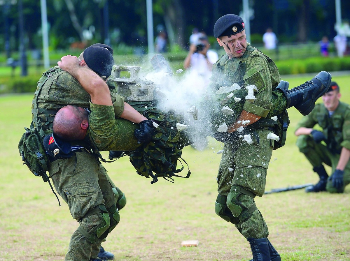 Russian marines show their skills during a demonstration at a park in Manila, yesterday. 