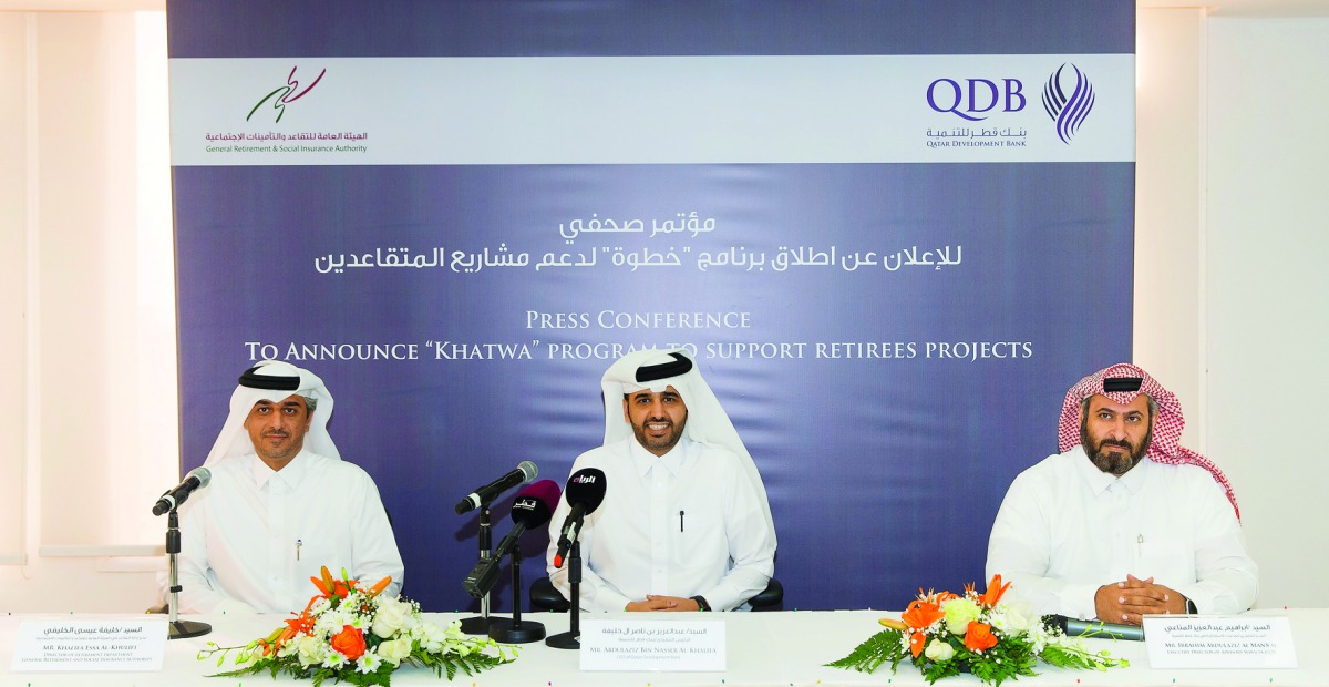 Abdulaziz bin Nasser Al Khalifa (centre),  Khalifa Essa Al Khulaifi (left) and  Ibrahim Abdulaziz Al Mannai, Executive Director, Advisory Services, QDB during a press  conference, yesterday.