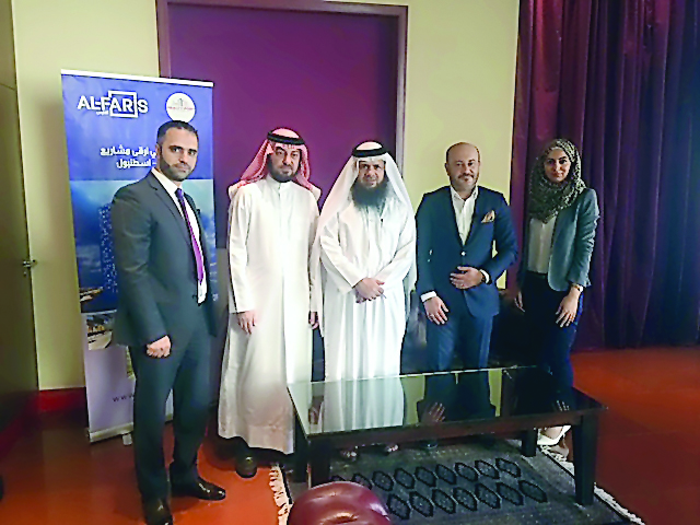 Officials of Al Faris Group and  Realty Port at the agreement signing ceremony.