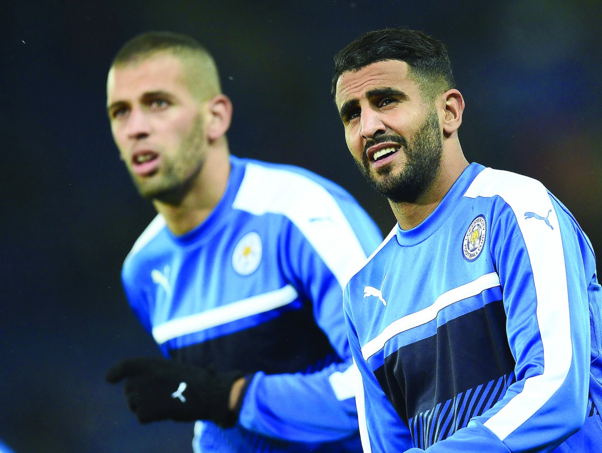 Leicester City's Islam Slimani (left) and Riyad Mahrez as they warm UP at the King Power Stadium in Leicester, central England in this October 18, 2016 file photo. 